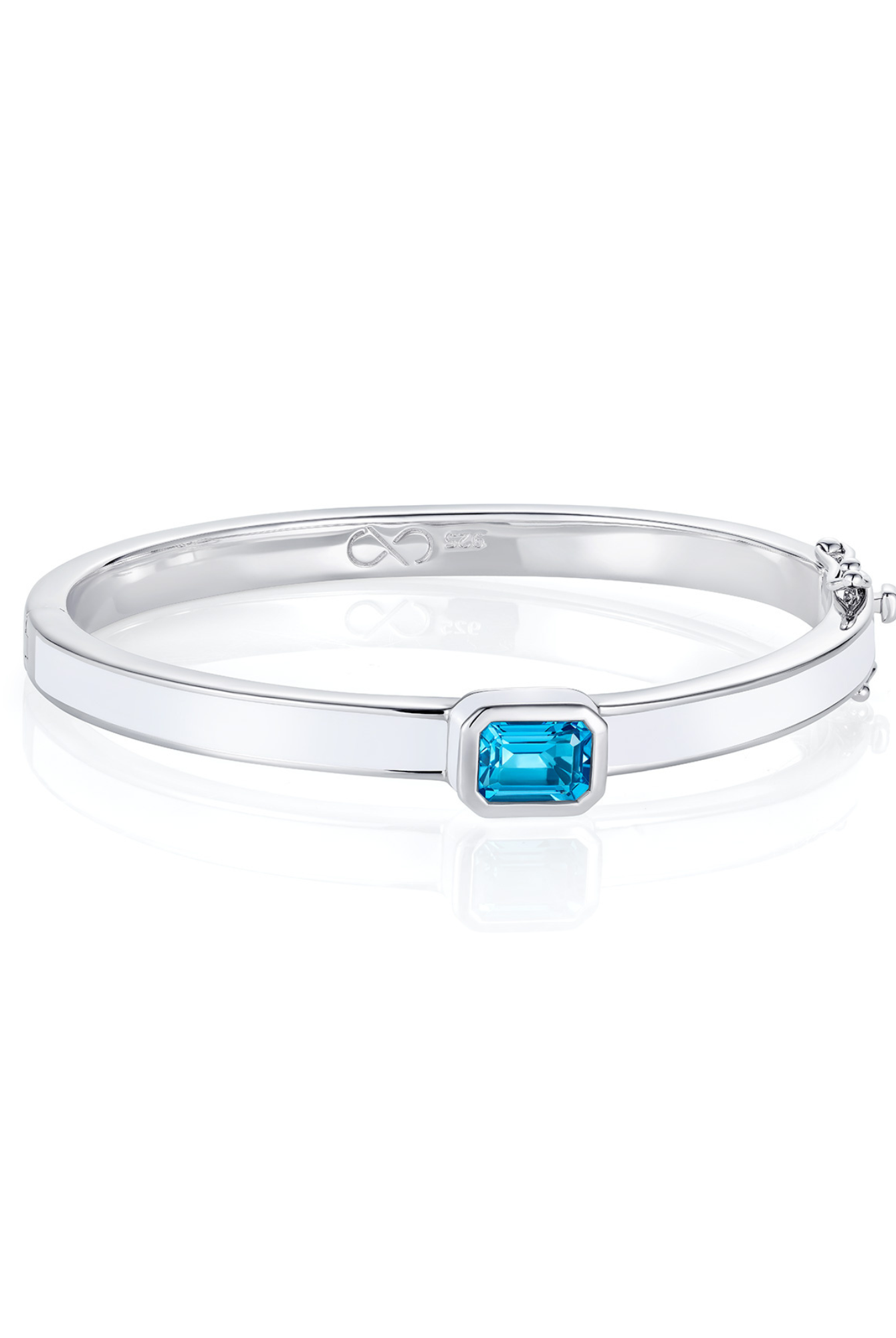 Sterling silver bangle with octagon blue topaz and hand-applied white enamel - Something Blue By Ostro